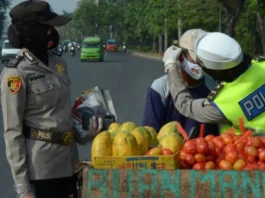 Covid-19 Meningkat di Kota Tangerang, HUT Polwan ke-72 Bagikan Masker ke Masyarakat