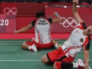 Ekspresi ganda putri Indonesia Greysia Polii/Apriyani Rahayu usai di Olimpiade Tokyo 2020 di Musashino Forest Sport Plaza, Tokyo, Jepang.