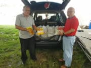 Anggota DPR RI, Ananta Wahana saat mengawasi penyaluran paket sembako untuk warga dari CSR BRI.