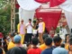 Muhammad Rizal Anggota DPR RI fraksi PAN saat memberikan sambutannya di kegiatan gerak jalan santai di Kresek.